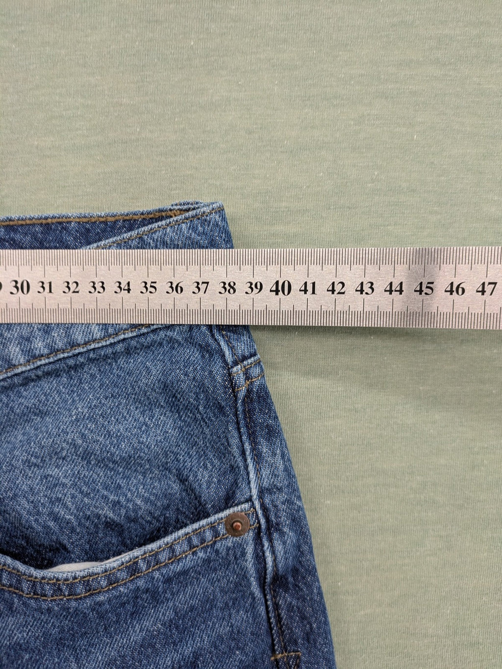 C&A blue straight jeans relaxed fit with traditional button fly and 5-pocket design.