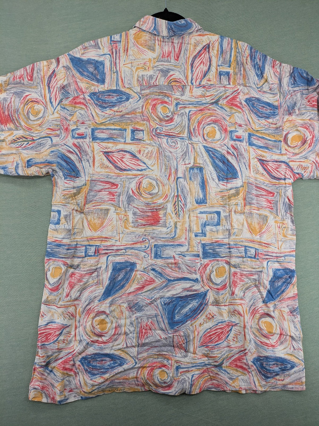Limit short-sleeve shirt multi-coloured abstract pattern, lightweight viscose, chest pocket detail.