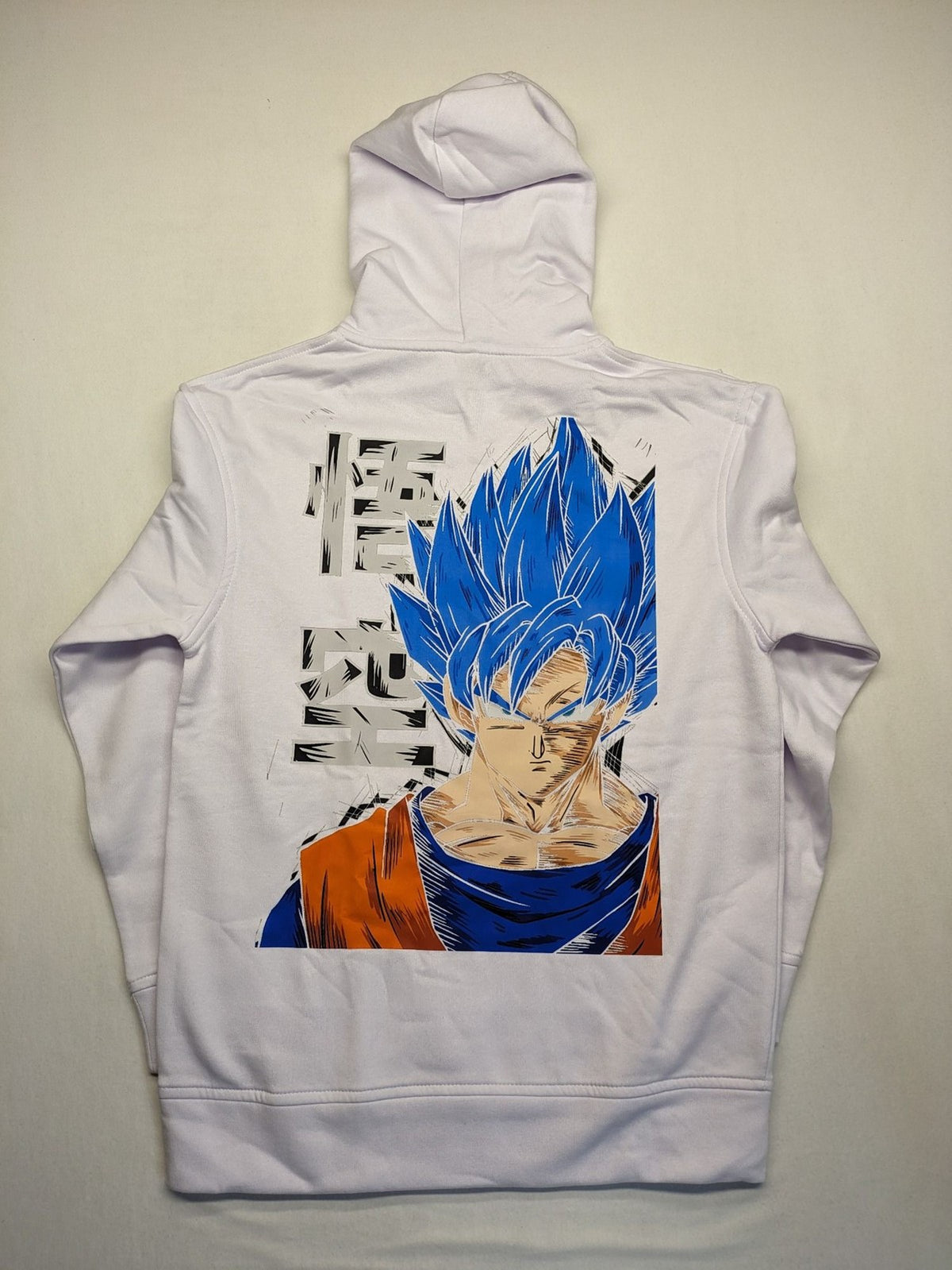 Dragon Ball Z blue hoodie with large Goku Super Saiyan Blue graphic print on back.