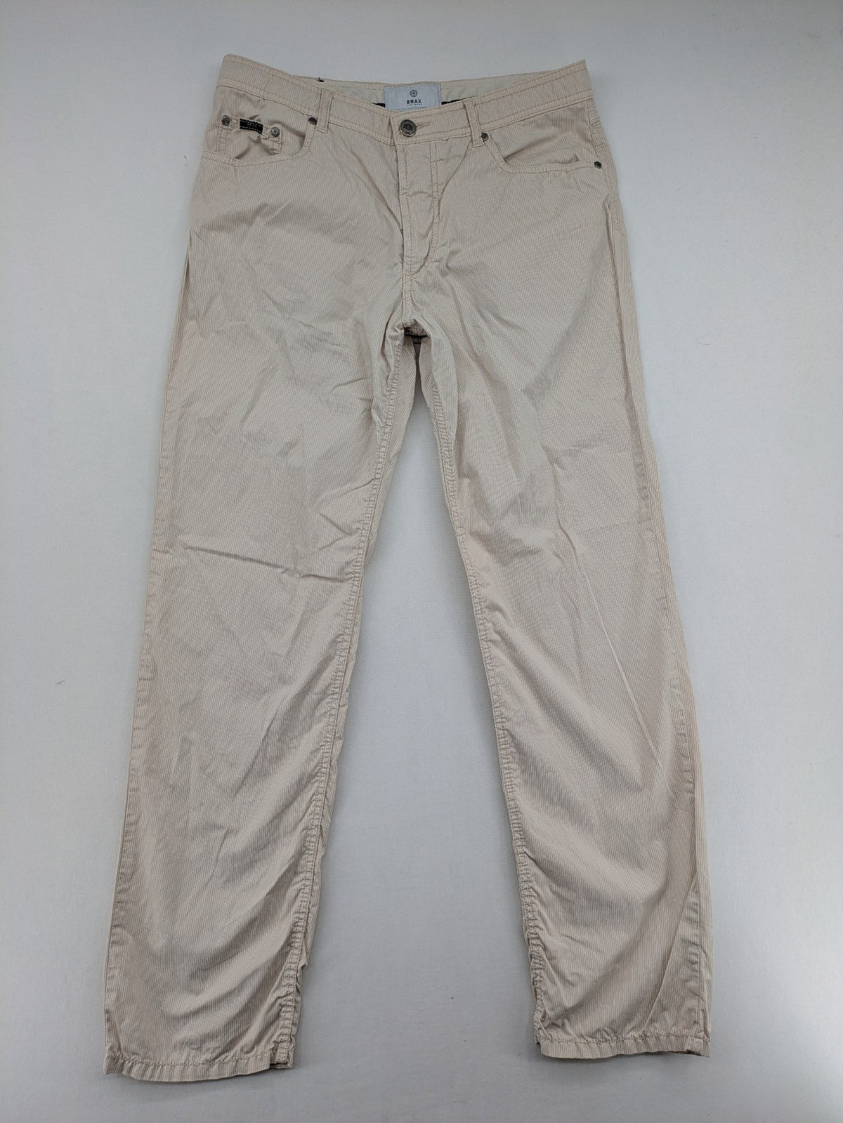 BRAX beige striped pants with logo, made from comfortable stretch cotton blend.