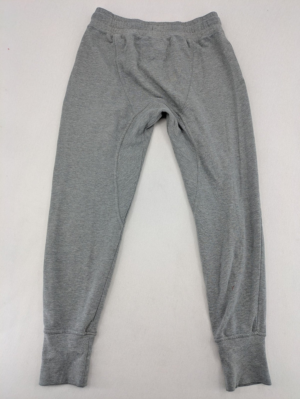 Private Baller grey sweatpants with "32" graphic print and blue drawstring.