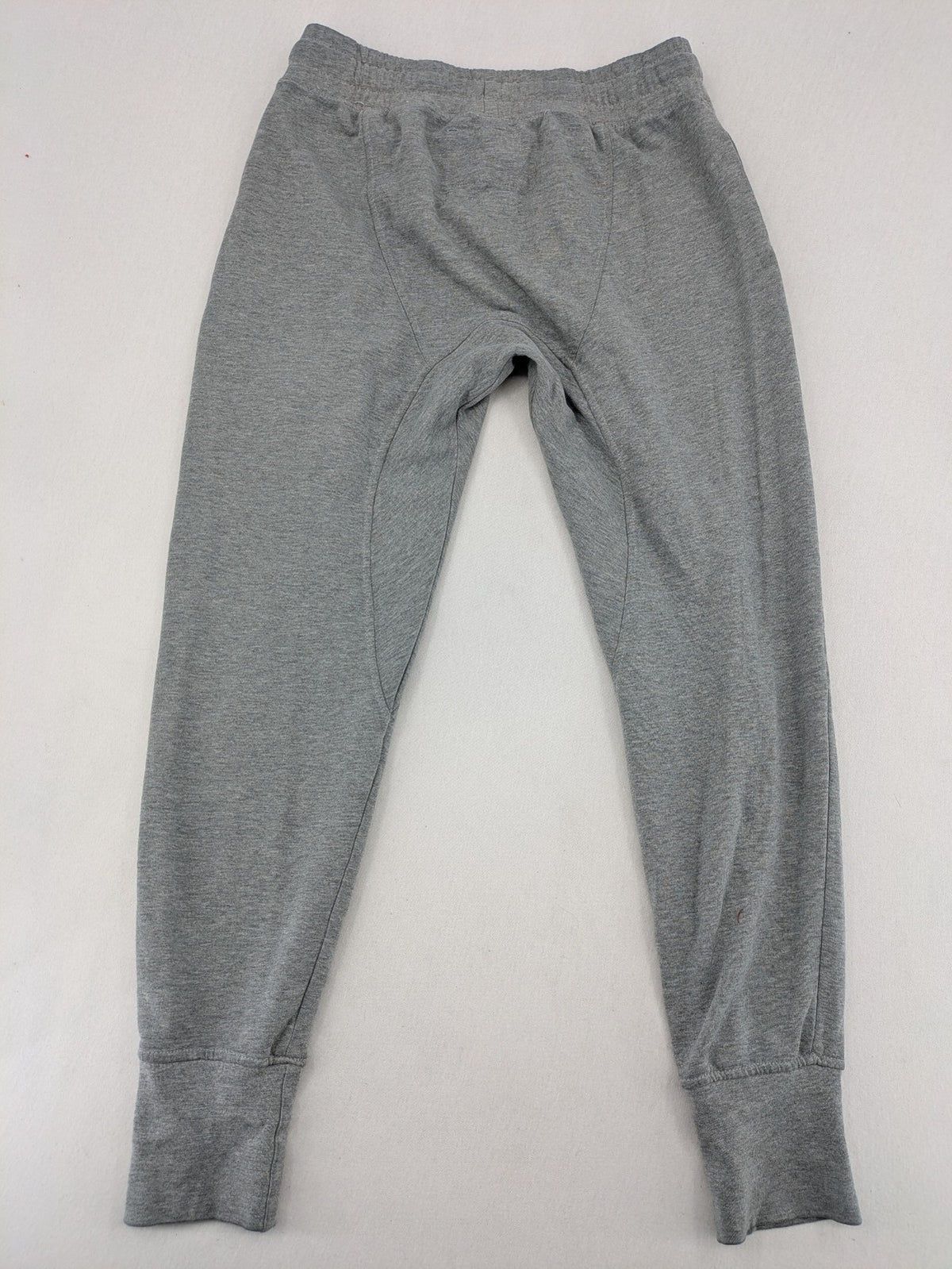 Private Baller grey sweatpants with "32" graphic print and blue drawstring.