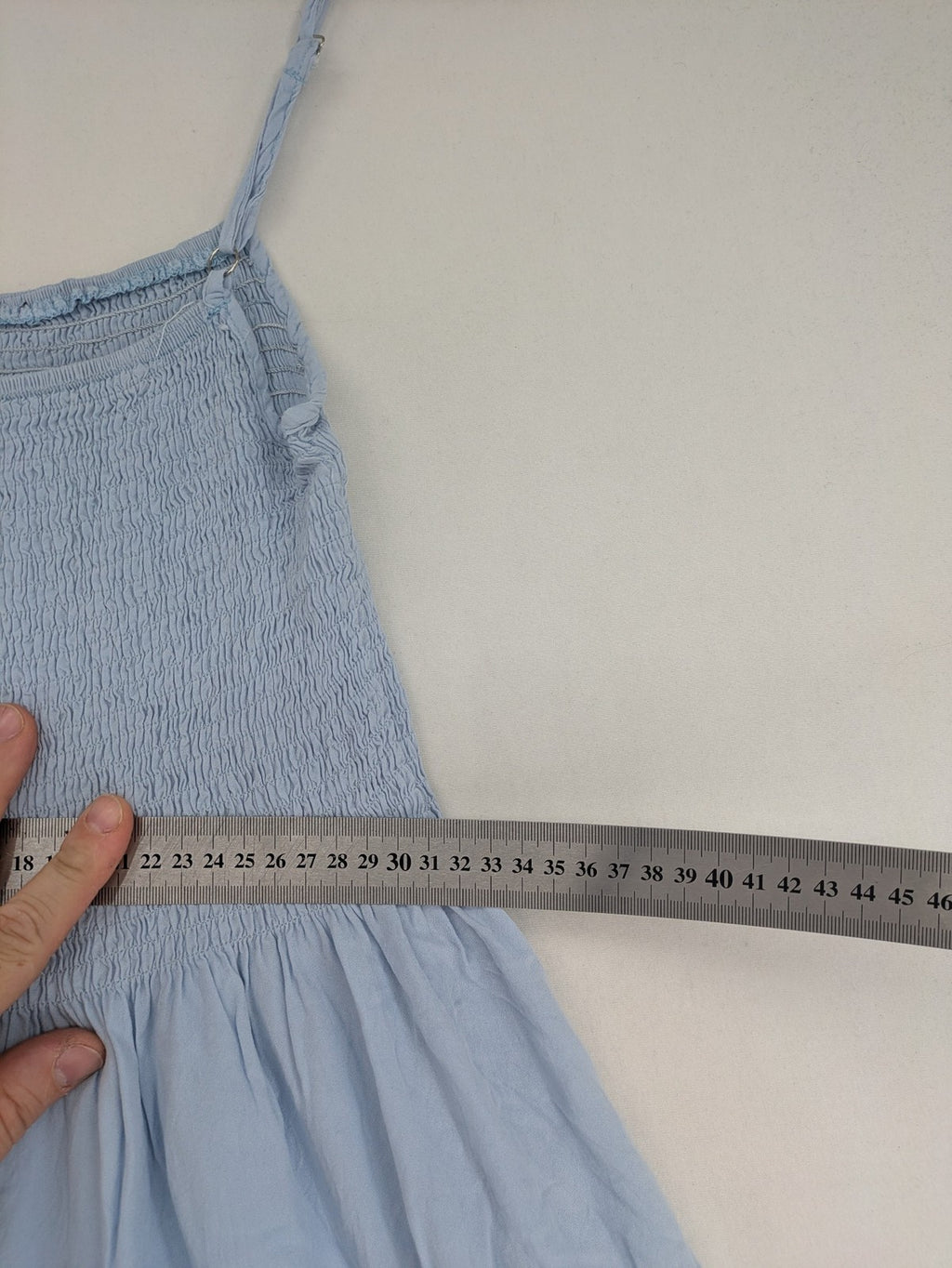 Ebelove blue summer dress with smocked bodice and adjustable spaghetti straps.