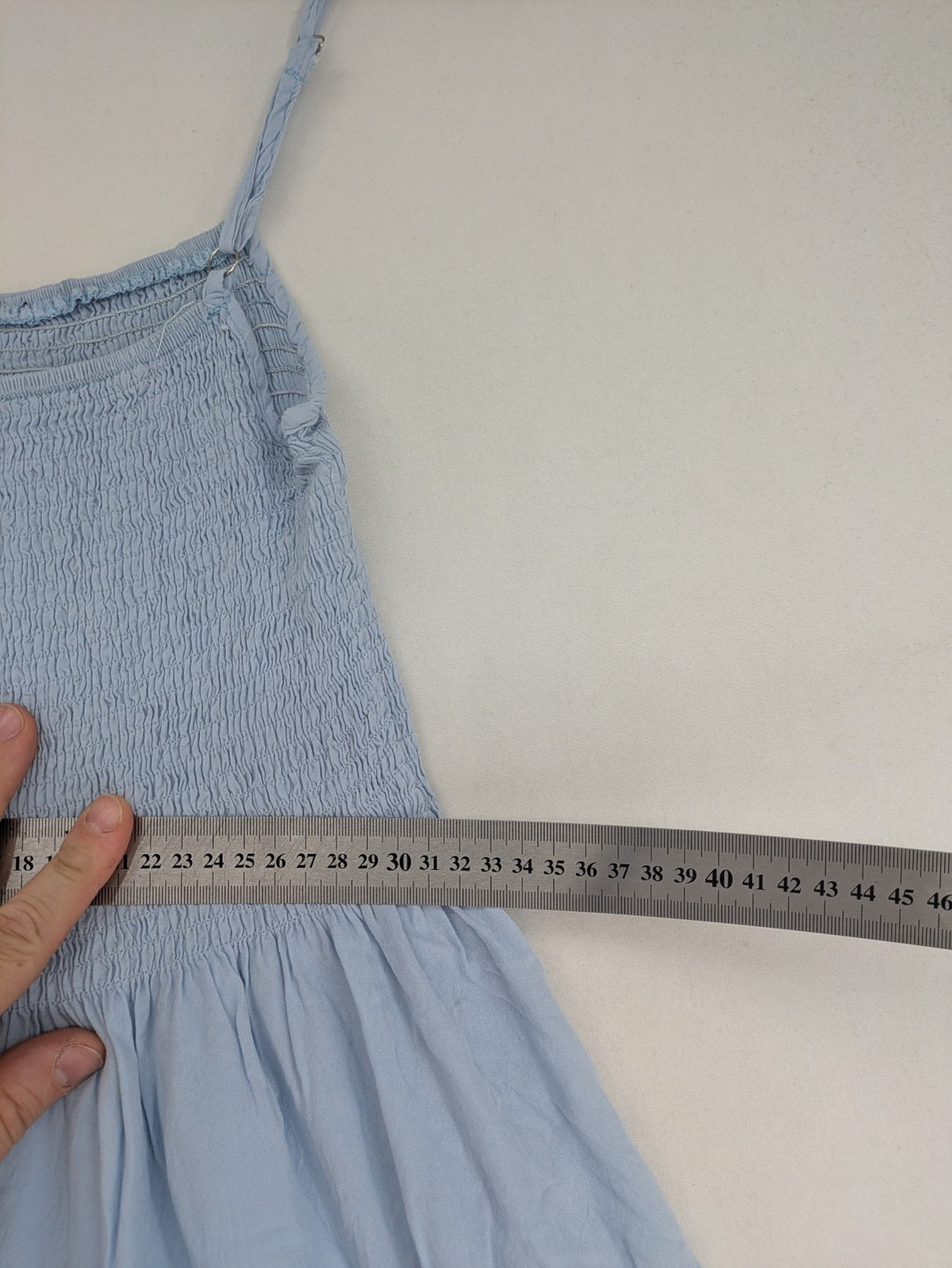Ebelove blue summer dress with smocked bodice and adjustable spaghetti straps.
