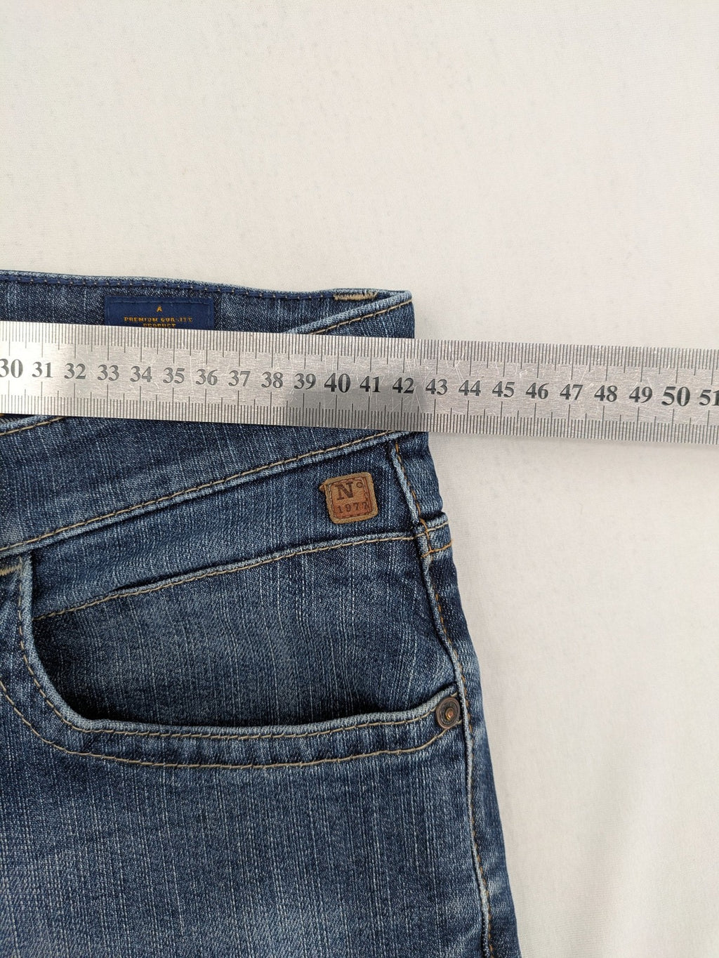 Camel Active blue straight jeans with classic 5-pocket design and logo patch.
