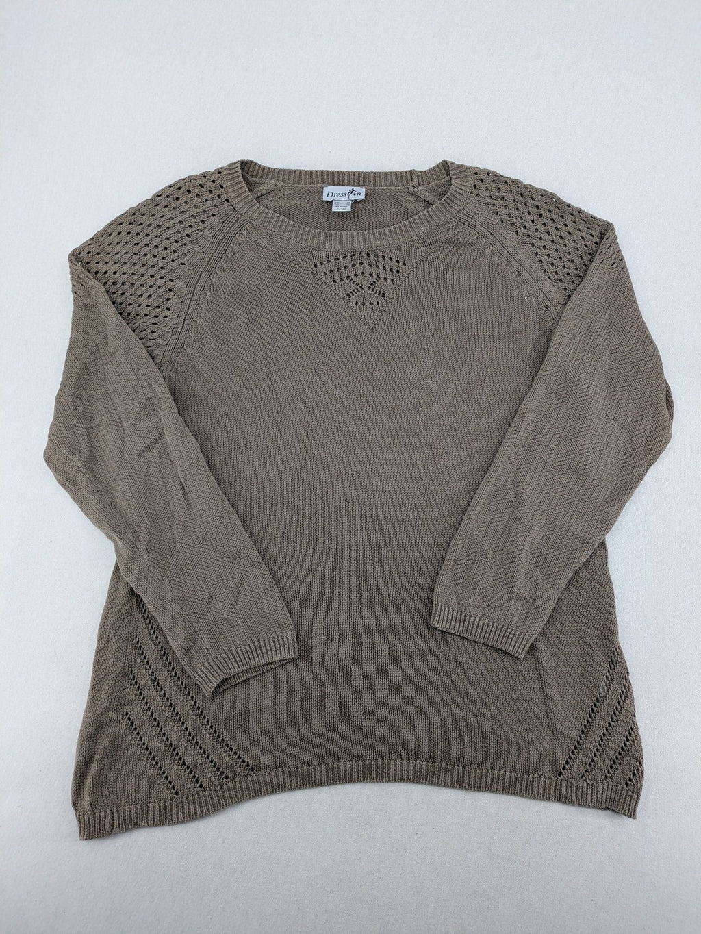 Dressin brown knit jumper with decorative open-knit details and comfortable fit.