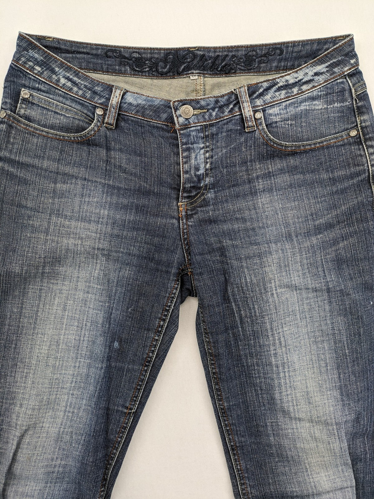 BLU blue straight jeans with washed effect, rolled hem, and five-pocket design.