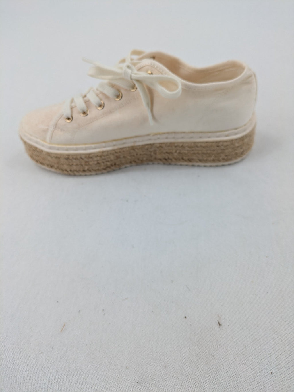 H&M beige espadrille sneakers with jute sole and cream canvas upper.