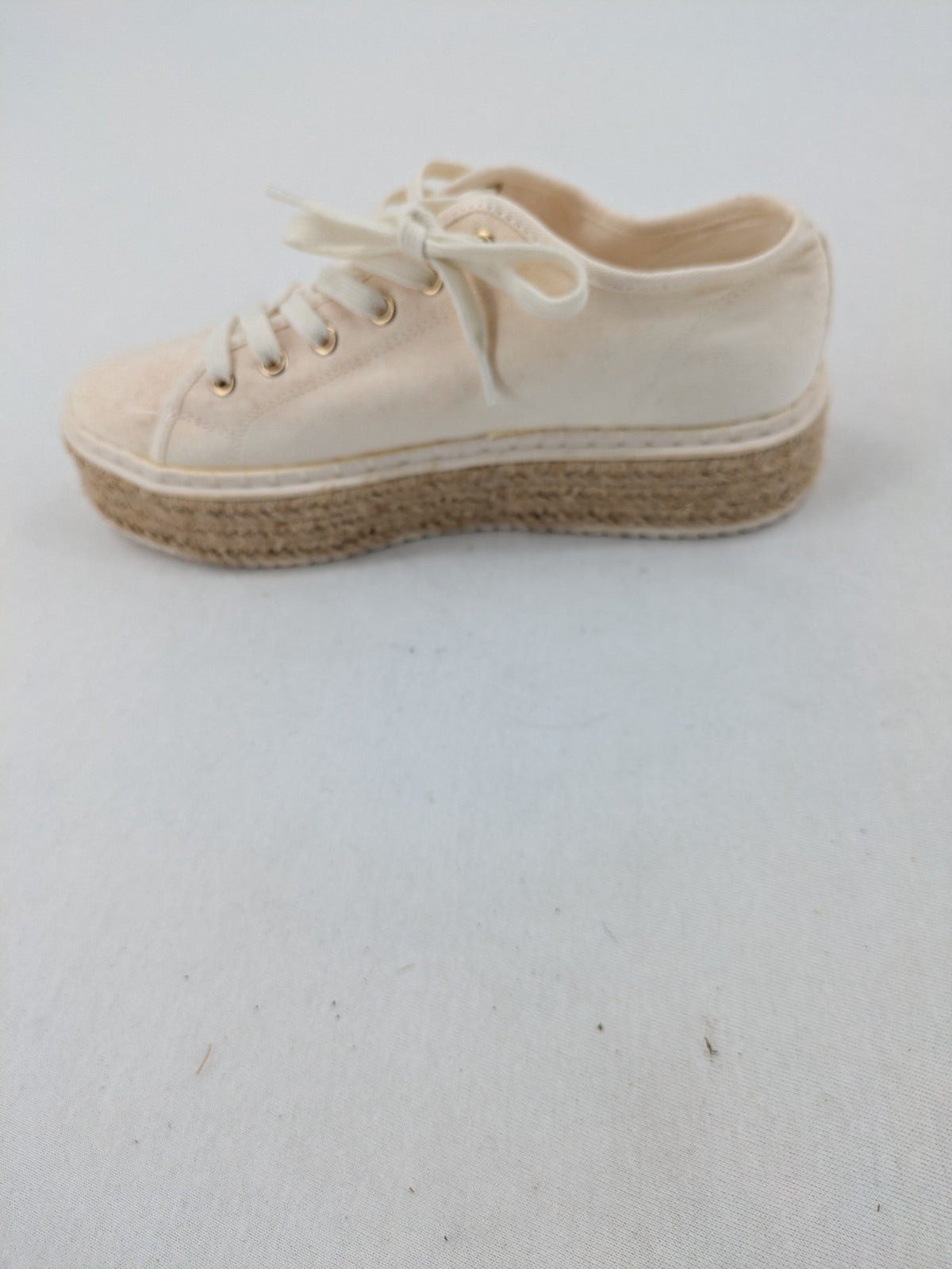 H&M beige espadrille sneakers with jute sole and cream canvas upper.