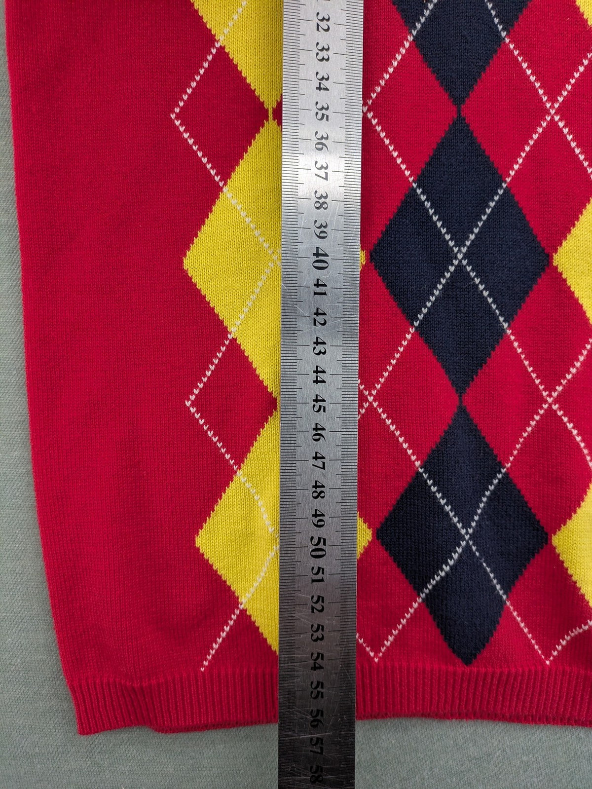 MAYSER multi turtle neck jumper argyle pattern in red, yellow, and black cotton.