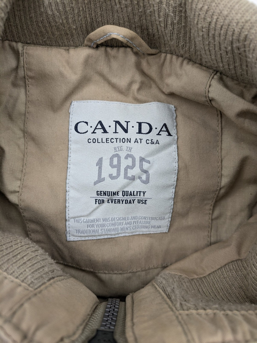 Canda beige bomber jacket full zip with ribbed collar and buttoned chest pockets.