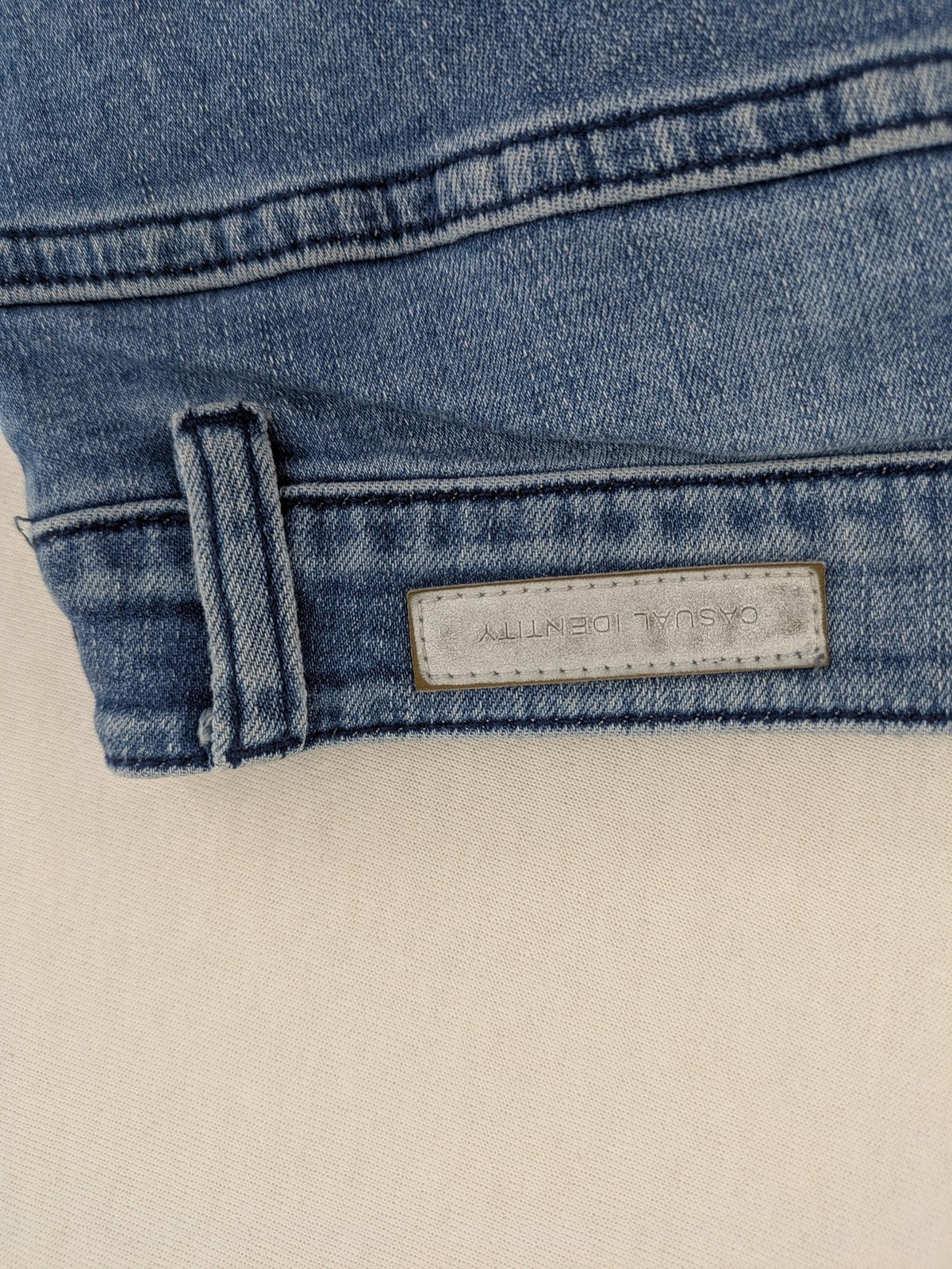 Comma blue skinny fit jeans with classic 5-pocket design and stretch denim material.