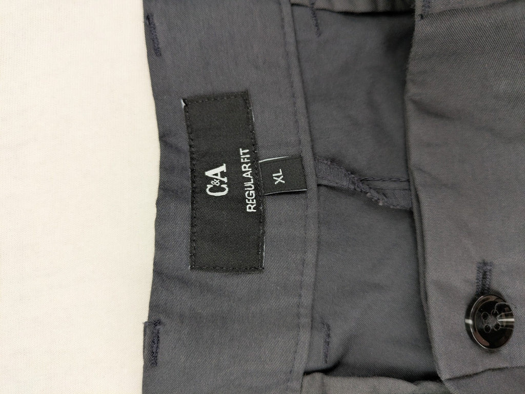 C&A pink pants regular fit with tag, versatile for business and leisure.