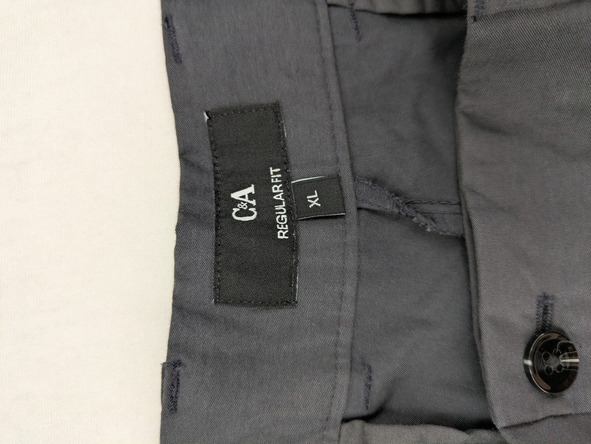 C&A pink pants regular fit with tag, versatile for business and leisure.