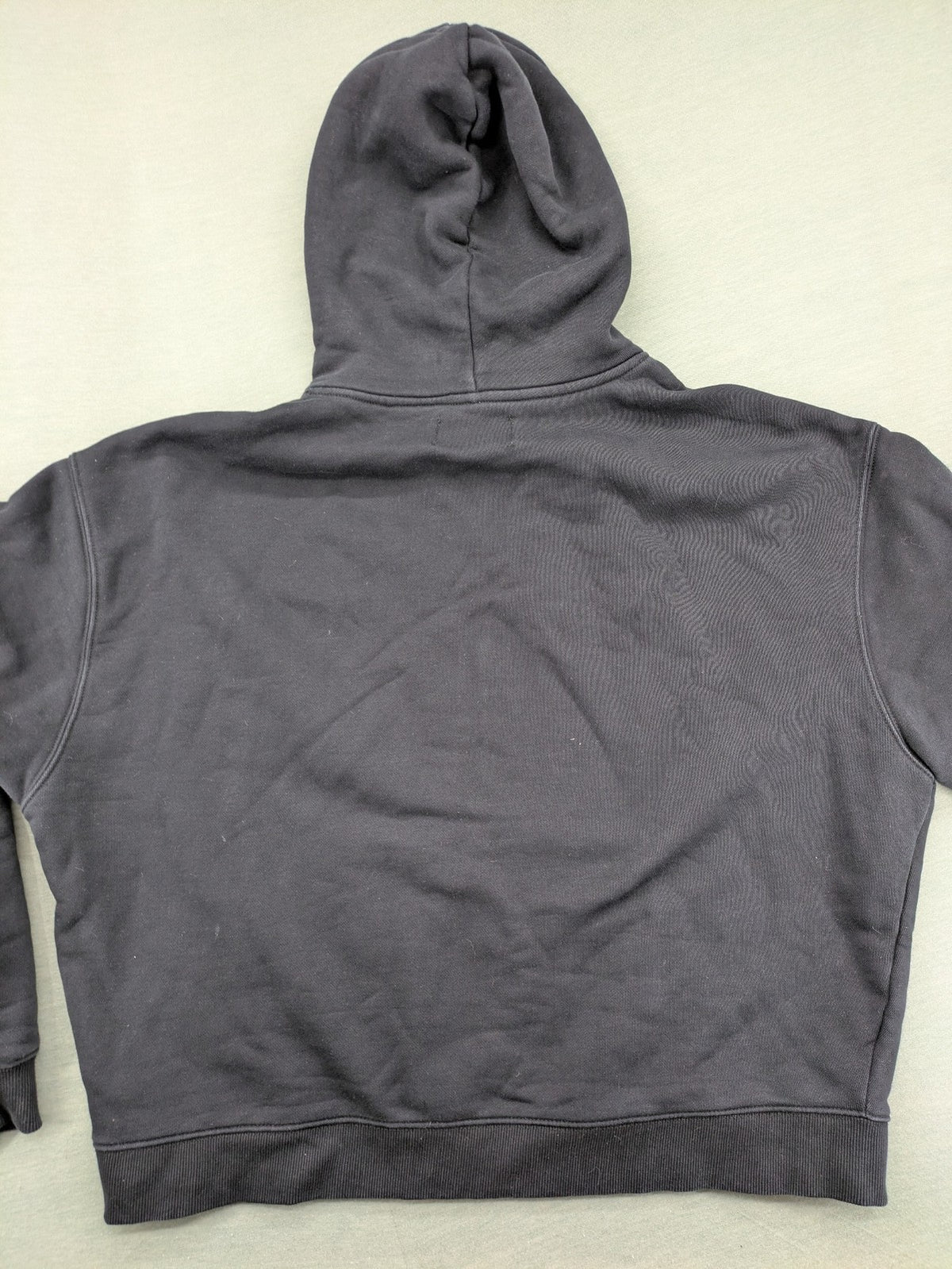 Lowlights Studios grey hoodie with embroidered logo and kangaroo pocket, 100% cotton.