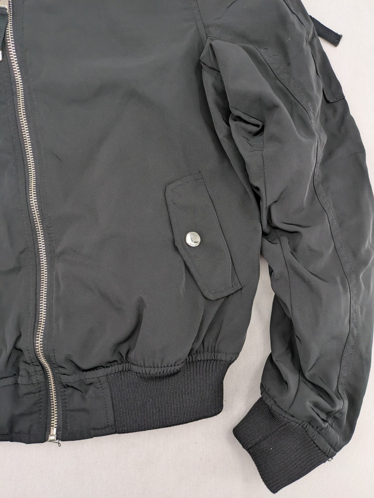 FB Sister grey bomber jacket with full zip, ribbed cuffs, and smooth polyester material.