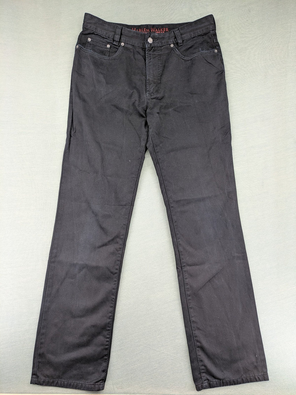 Joker black straight jeans five-pocket design with prominent stitching and brand details.