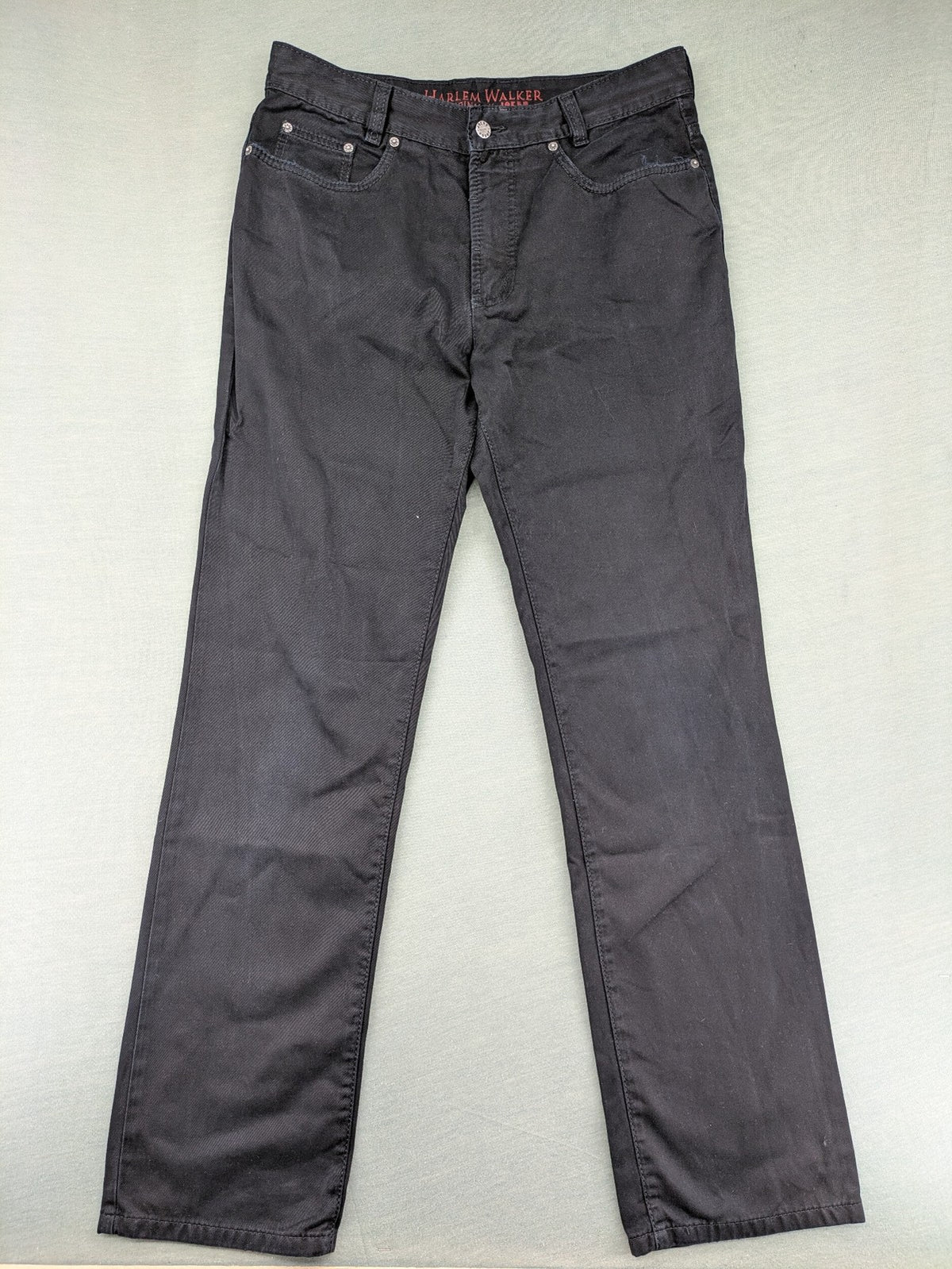 Joker black straight jeans five-pocket design with prominent stitching and brand details.