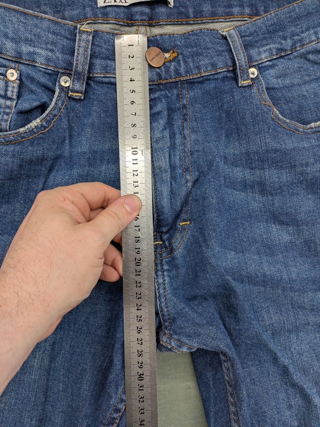 Zara blue straight jeans with medium wash, lightweight denim, and regular fit.