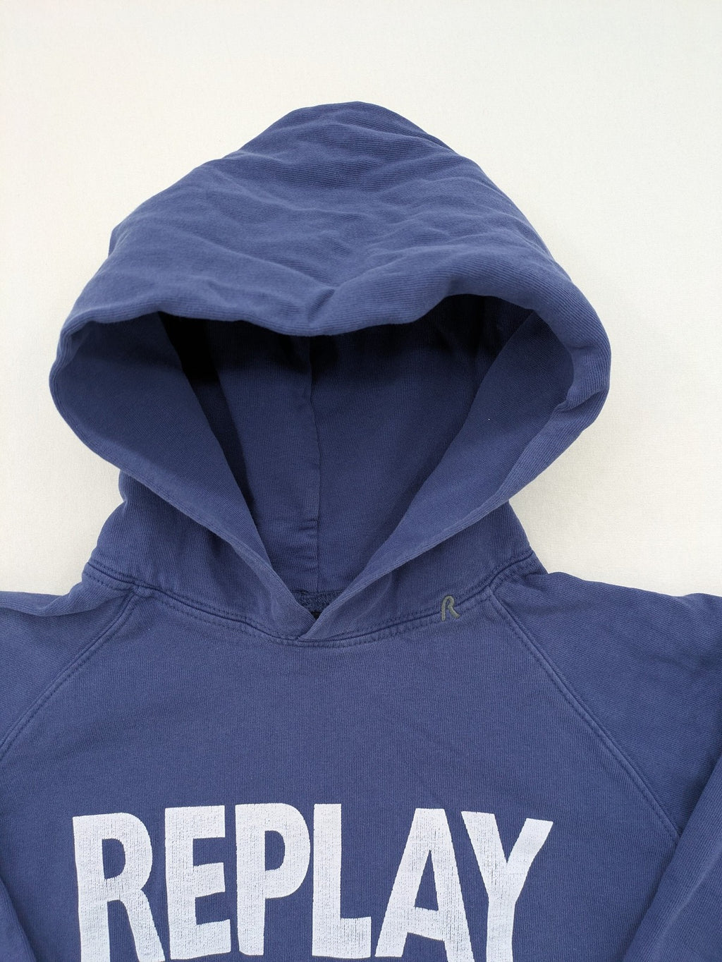 Replay blue turtle neck jumper with large logo print and kangaroo pocket, 100% cotton.