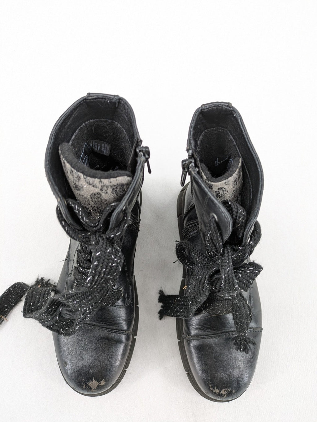 Graceland black combat boots with front lacing and chunky platform sole.