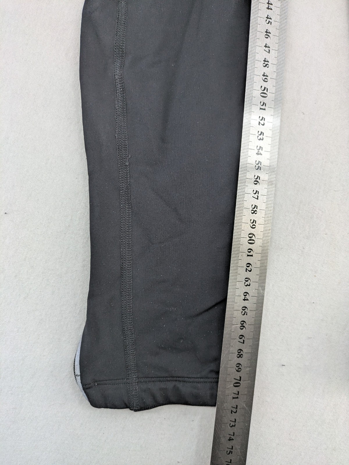 GORE RUNNING WEAR black bicycle tights with reflective details and zippered ankle openings.
