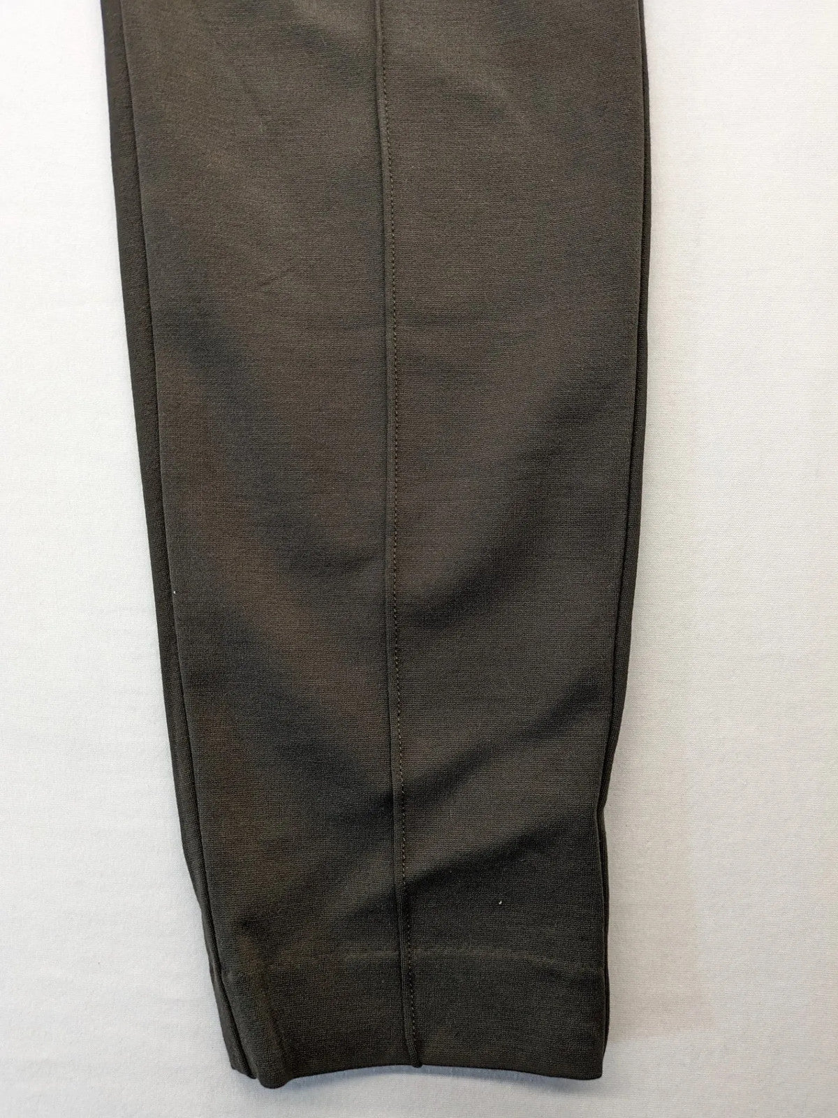 H&M khaki pants with front seam detail and stretchy material for comfort.