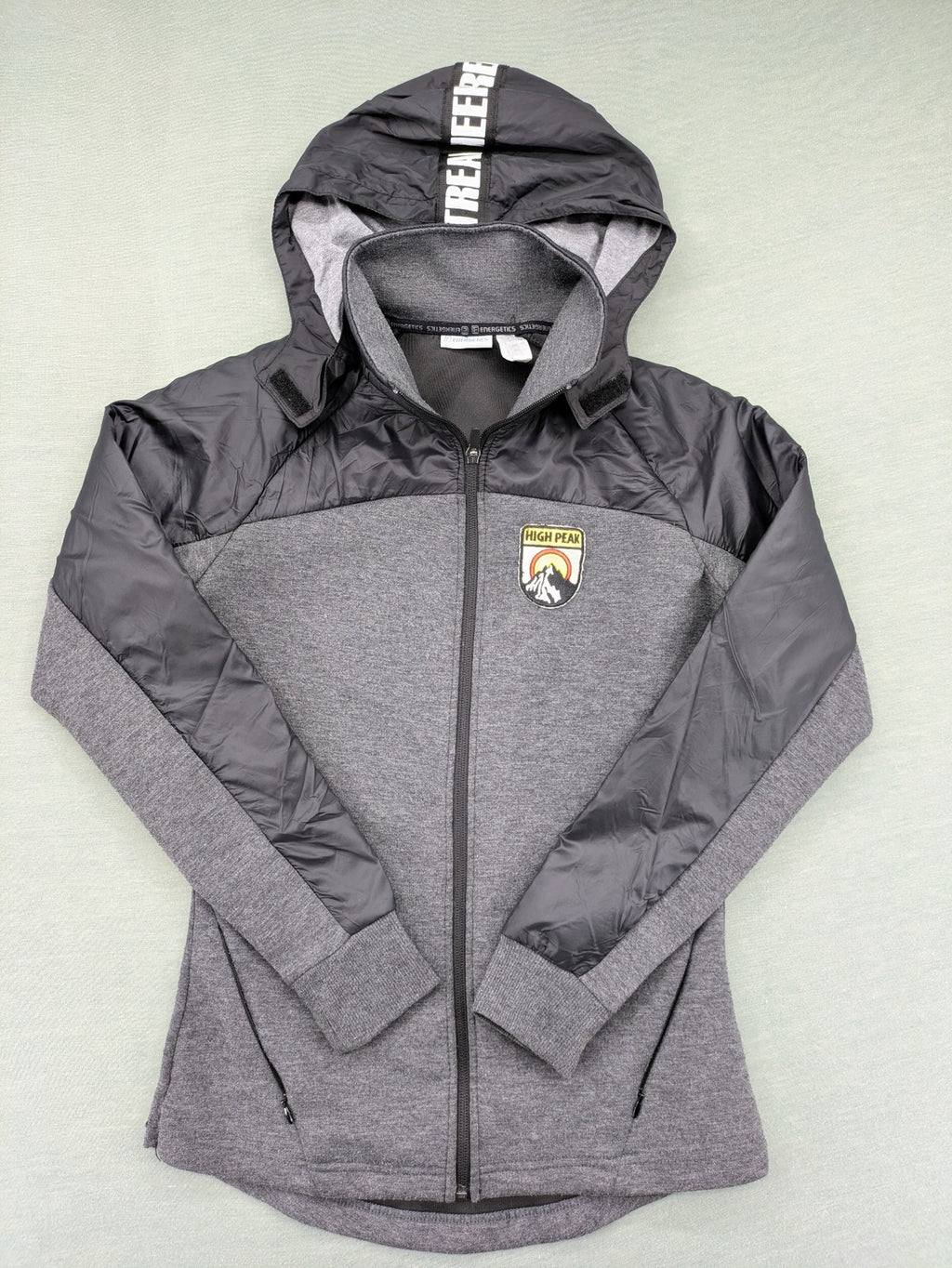 Energetics hybrid jacket black grey with High Peak patch and zip-up design.