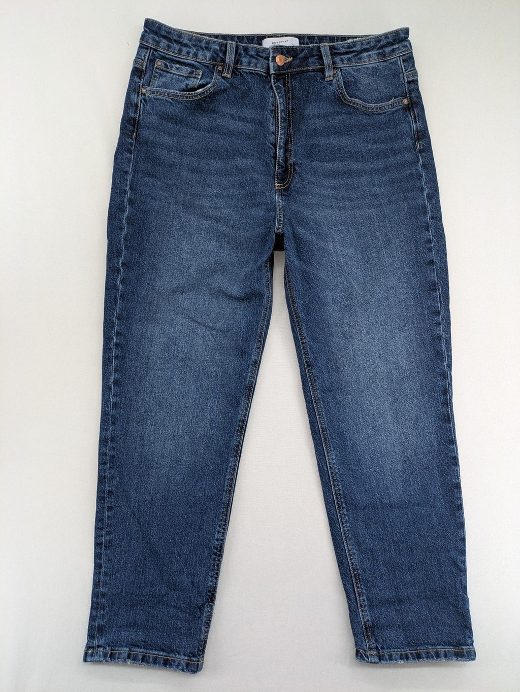 Reserved blue straight jeans high waist with classic fit and stretch cotton material.
