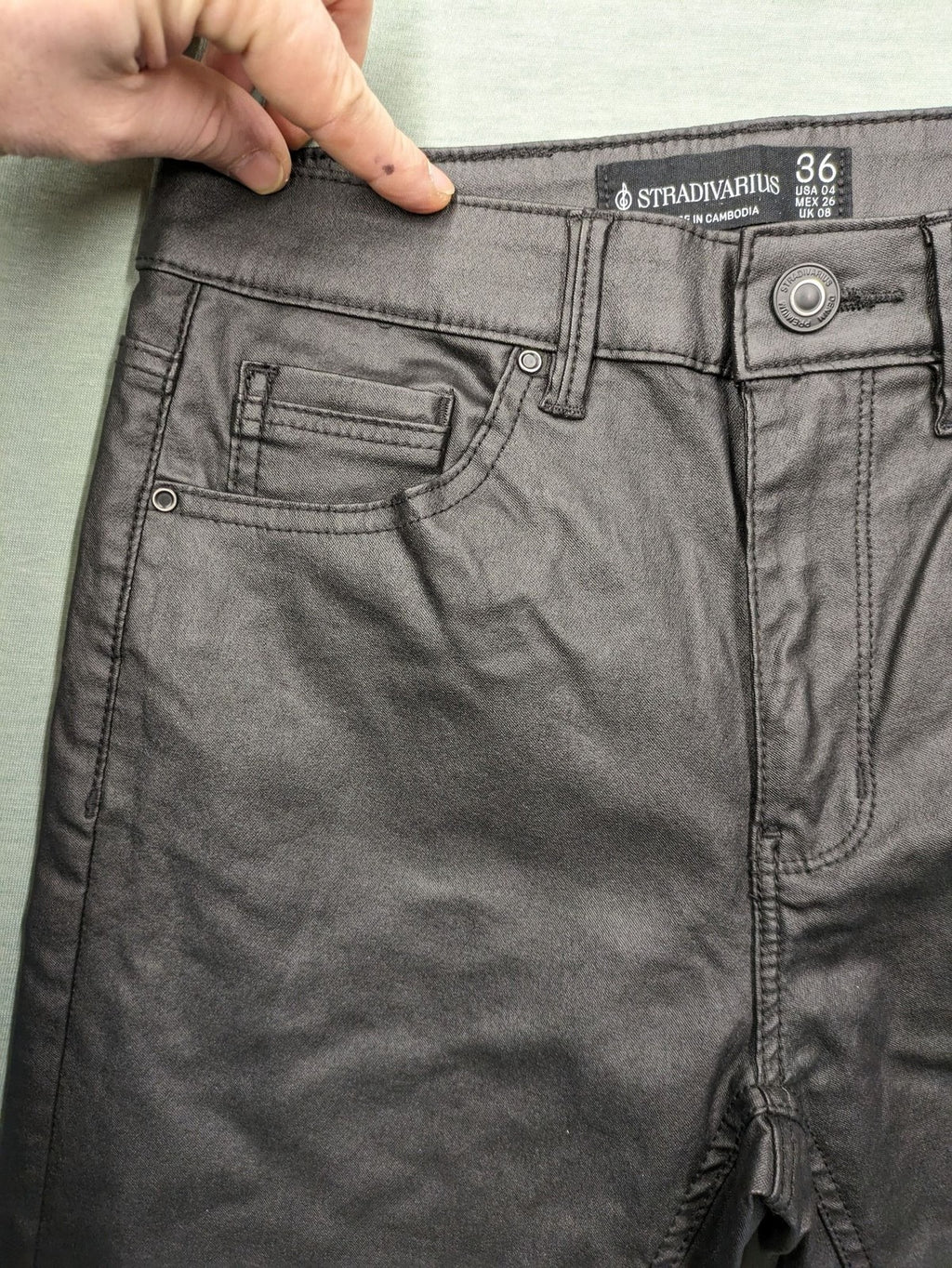 Stradivarius black coated skinny jeans faux leather finish stylish silhouette