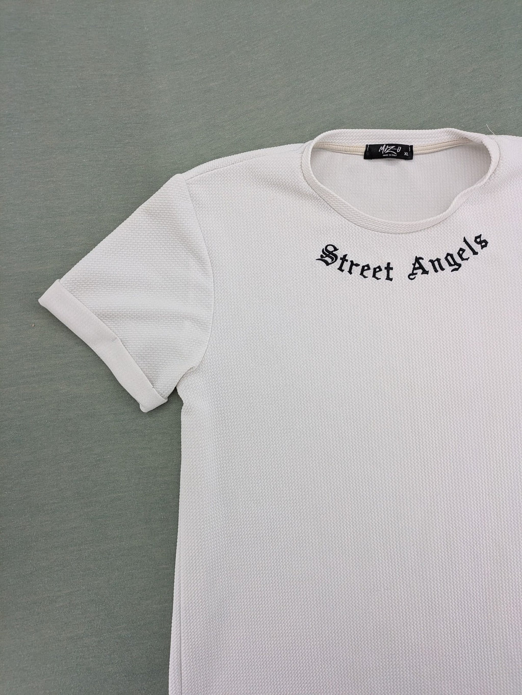 MIZ-U white longline t-shirt with "Street Angels" embroidery and rolled sleeves.