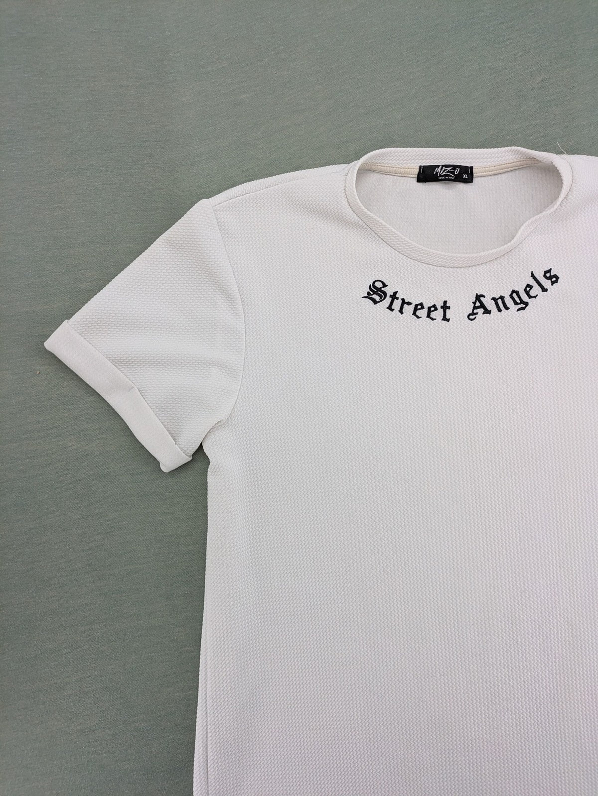 MIZ-U white longline t-shirt with "Street Angels" embroidery and rolled sleeves.