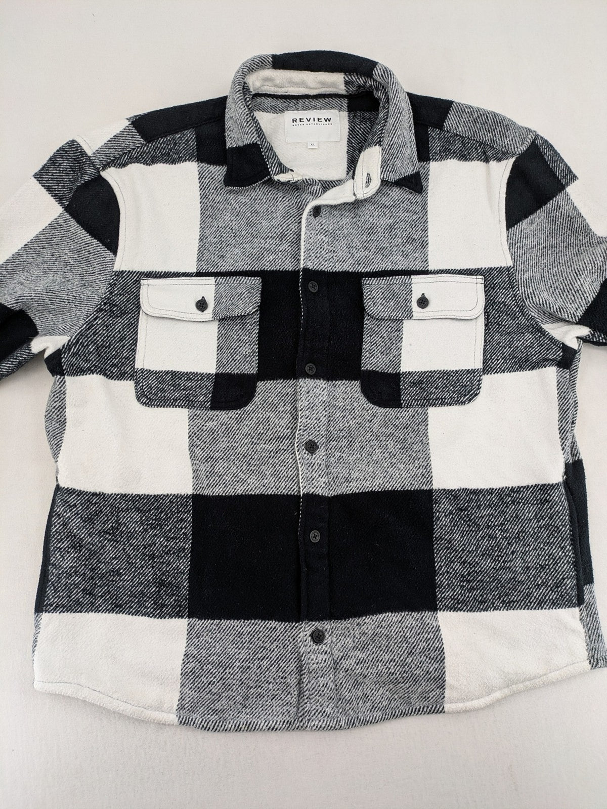 Review flannel jacket black white checkered pattern cotton material with chest pockets