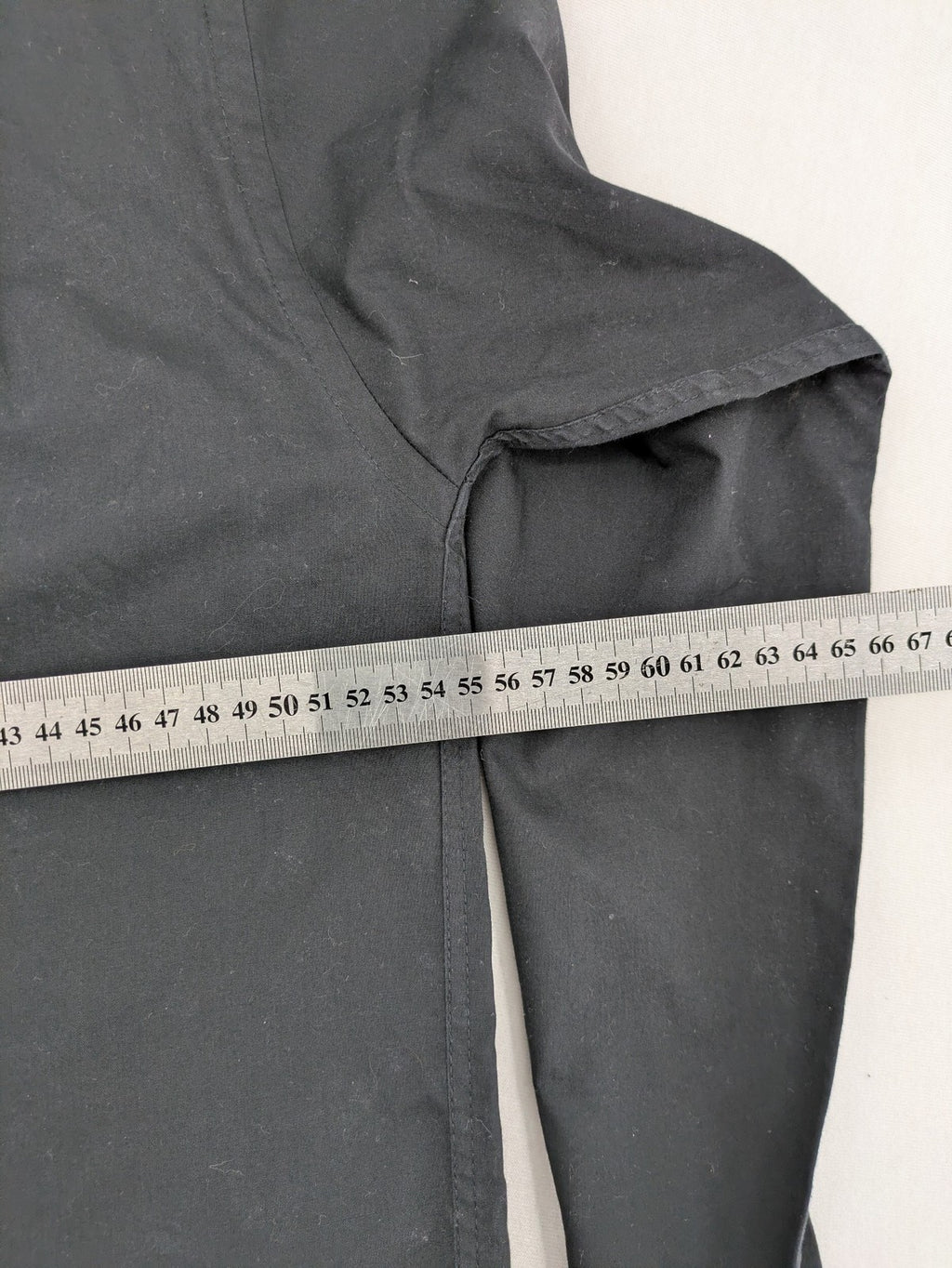 Cedarwood State black long sleeve shirt with classic collar and chest pocket.