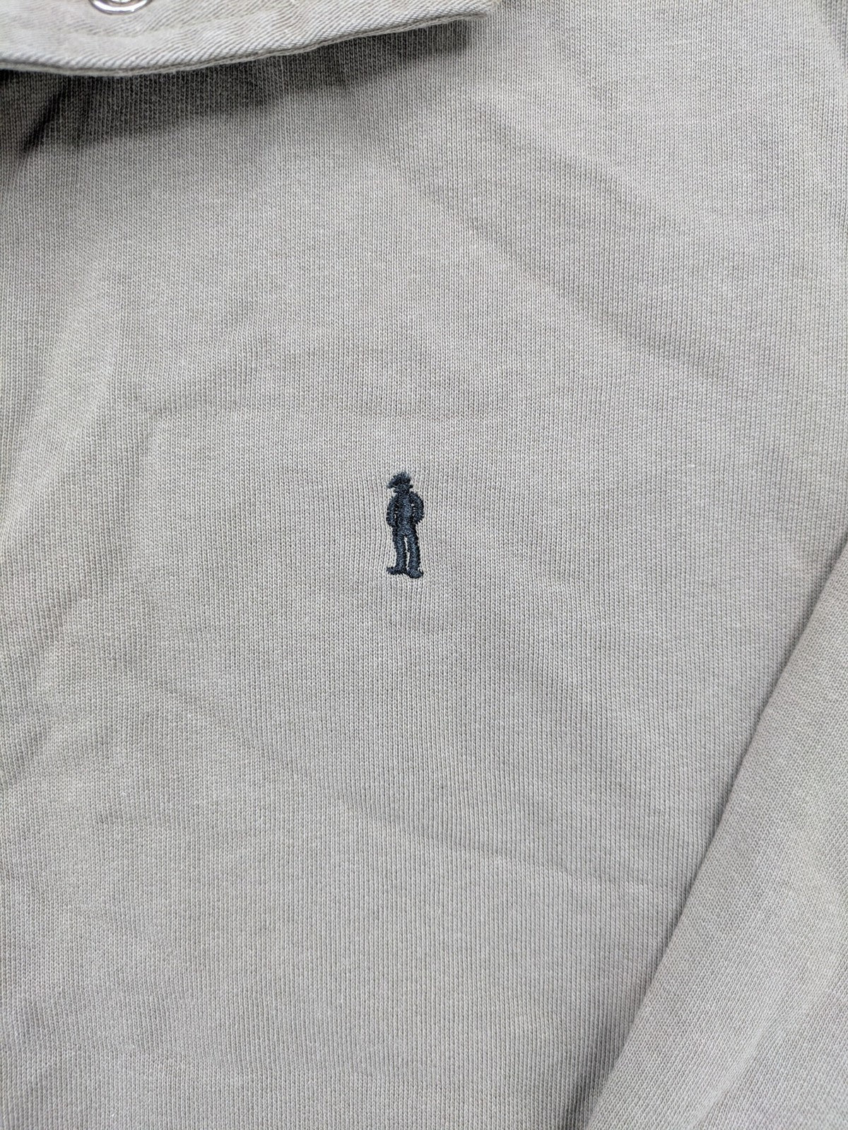 Tony Brown brown turtle neck jumper with embroidered logo and zip button placket.