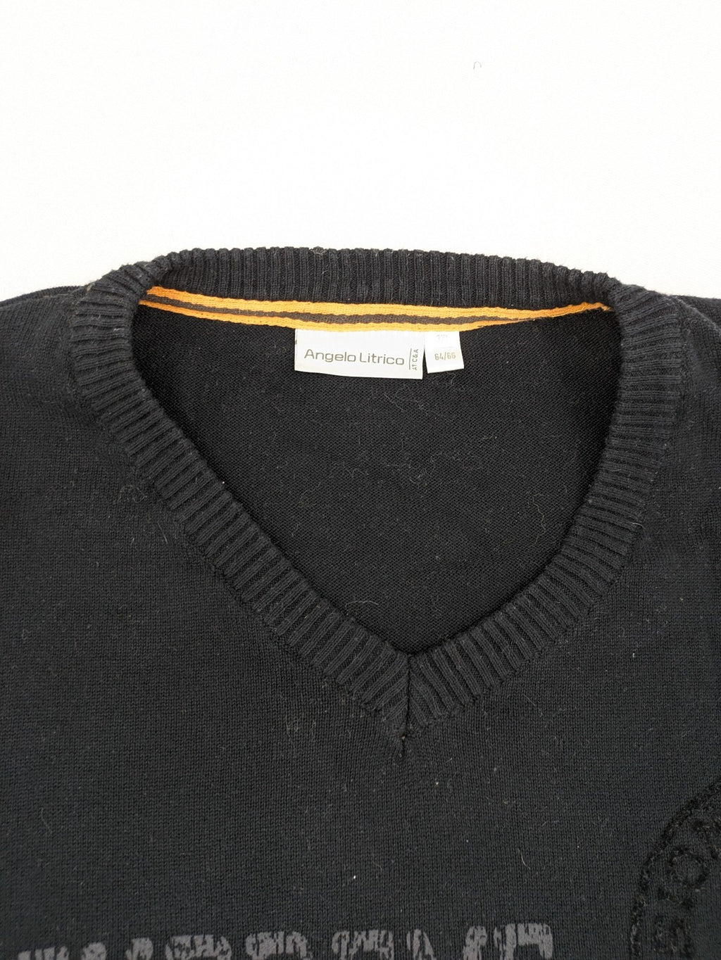 Angelo Litrico black knit jumper V-neck with tonal emblem and "Supreme Oil Quality" graphic.