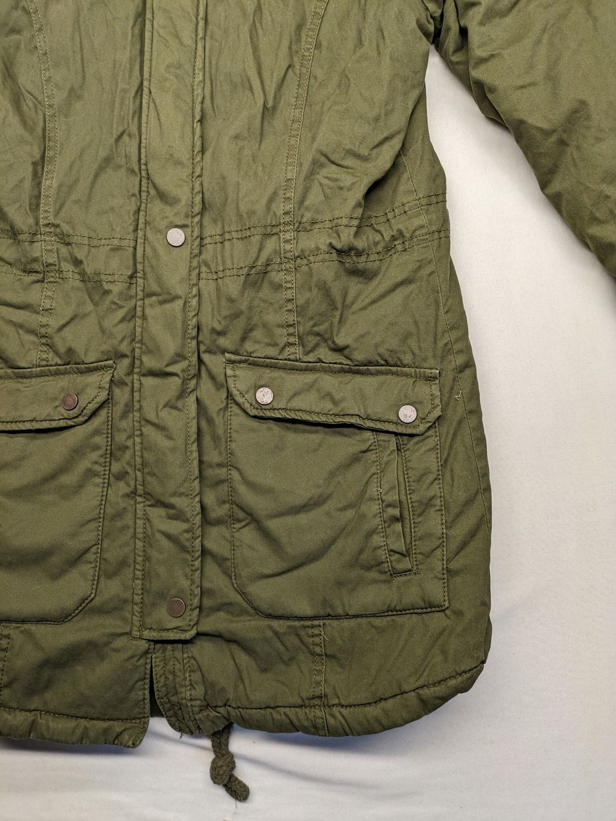 Vp Fashion khaki parka coat with "Bloomin' Lovely" floral embroidery and quilted lining.