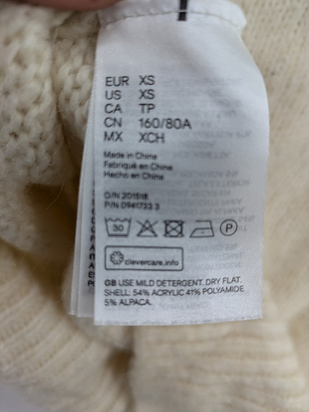 H&M beige turtle neck jumper soft alpaca blend off-shoulder design with wide collar.
