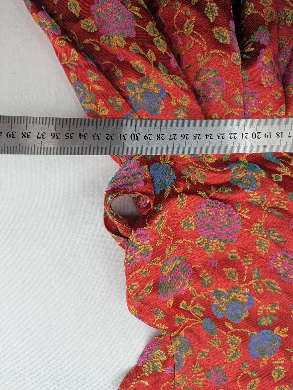 Jacquard multi A-line dress red floral jacquard pattern with matching waist tie.