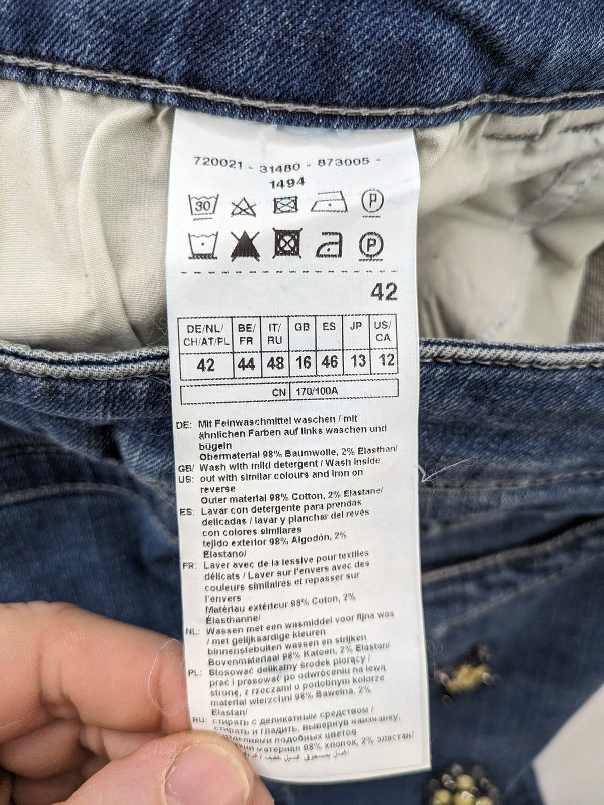 Gerry Weber blue straight jeans with decorative rhinestone appliqués and stretch denim material.