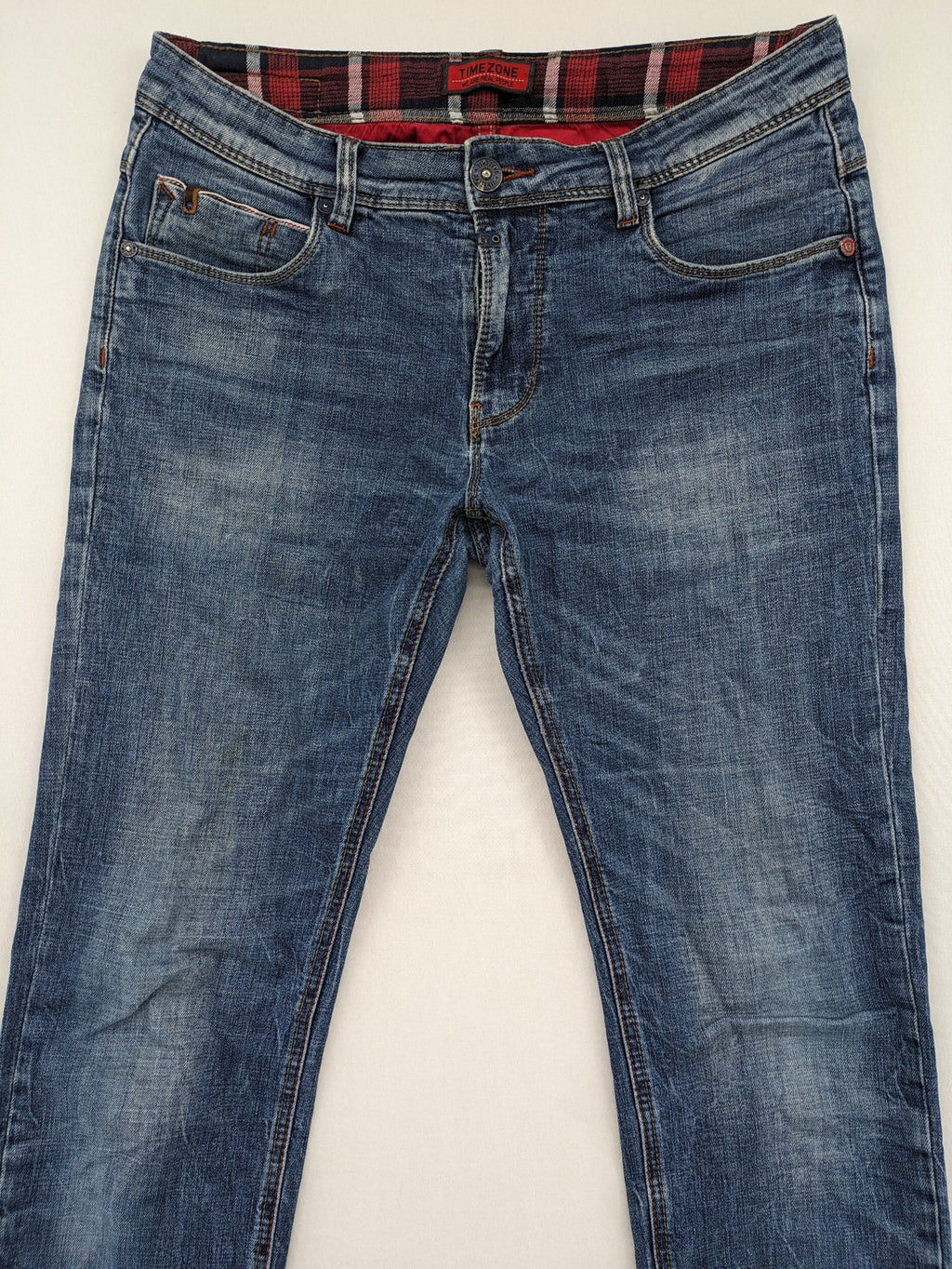 Timezone blue straight jeans slim fit with checkered pattern lining and button fly.