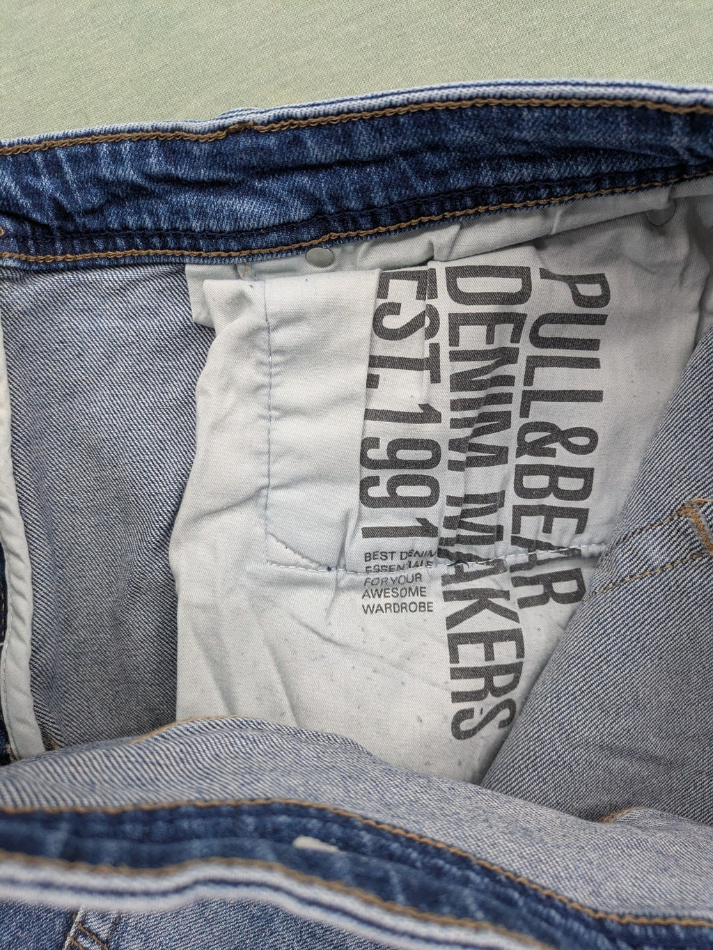 Pull&Bear blue straight jeans with distressed details and classic 5-pocket design.
