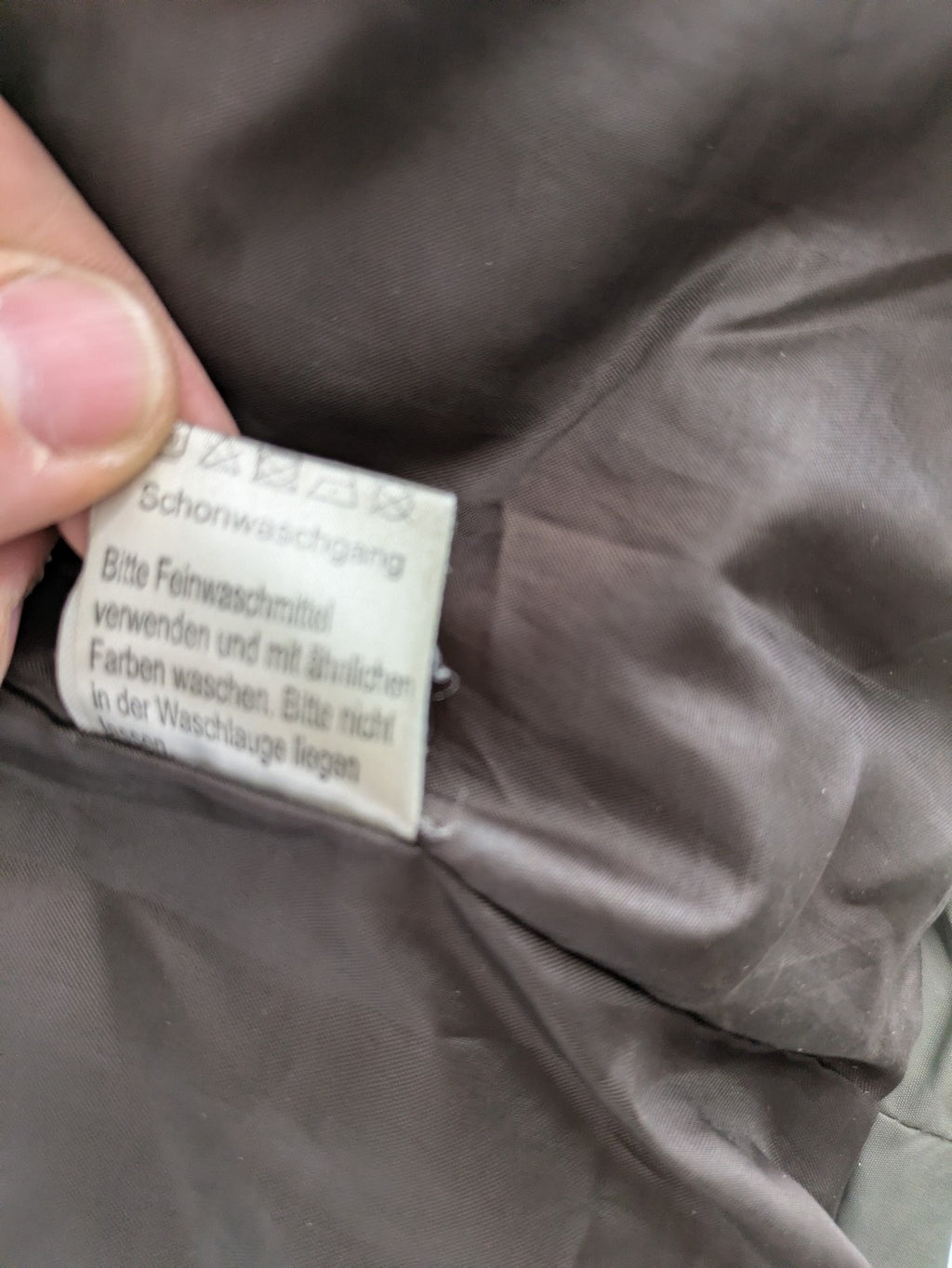 Camargue grey quilted jacket with fleece collar and buttoned pockets.