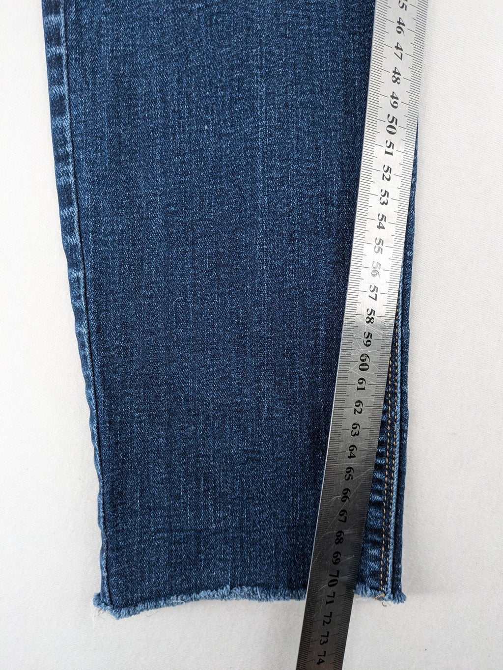 Esprit blue slim fit jeans with frayed hem and classic 5-pocket style.