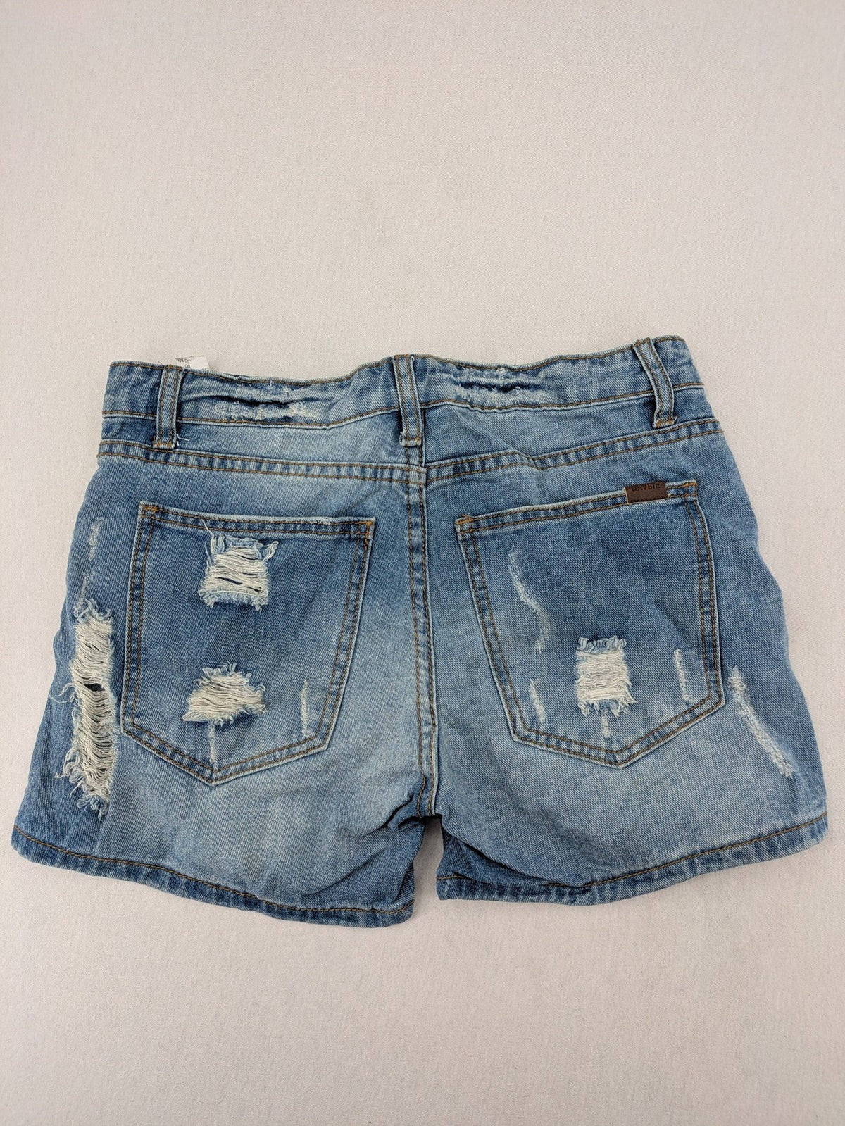 Daysie blue boyfriend jeans shorts with distressed rips and classic 5-pocket design.