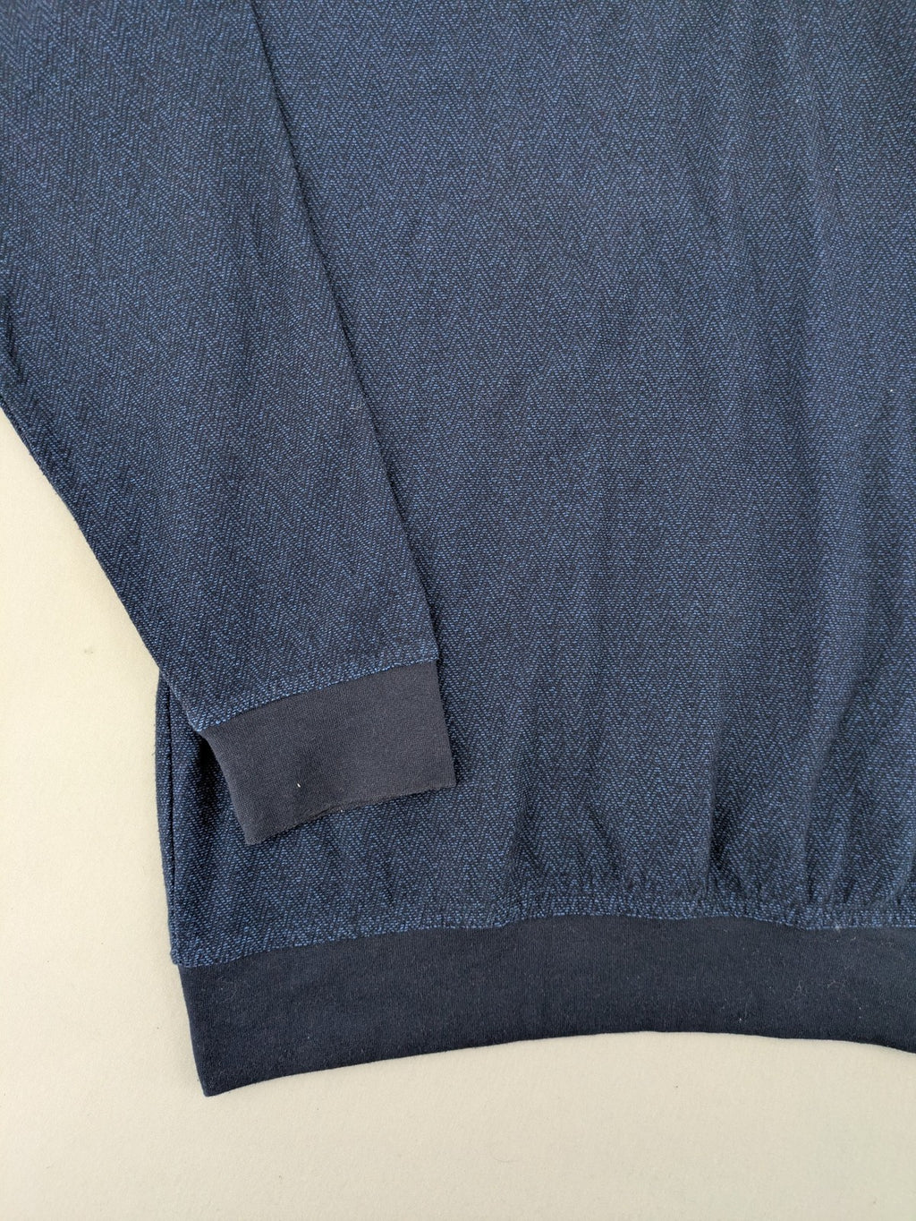 Hajo navy turtle neck jumper with herringbone pattern, zip collar, and chest pocket.