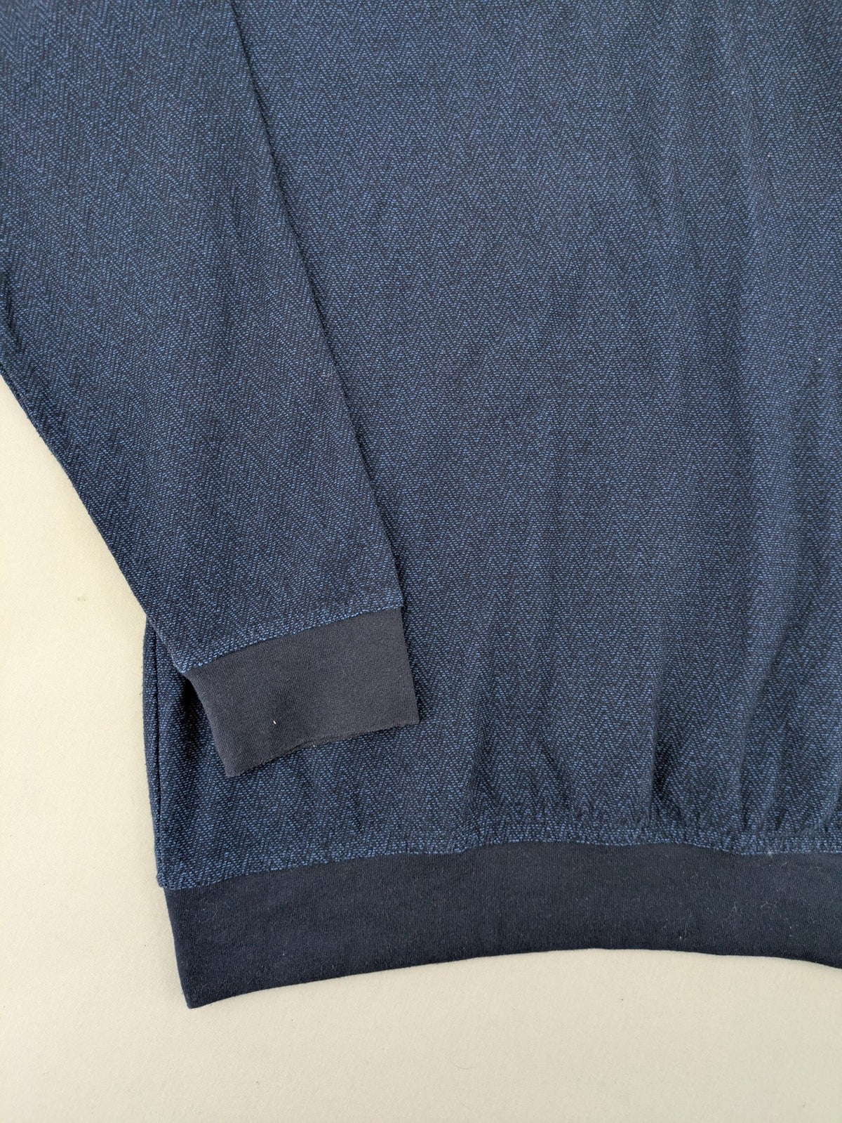Hajo navy turtle neck jumper with herringbone pattern, zip collar, and chest pocket.