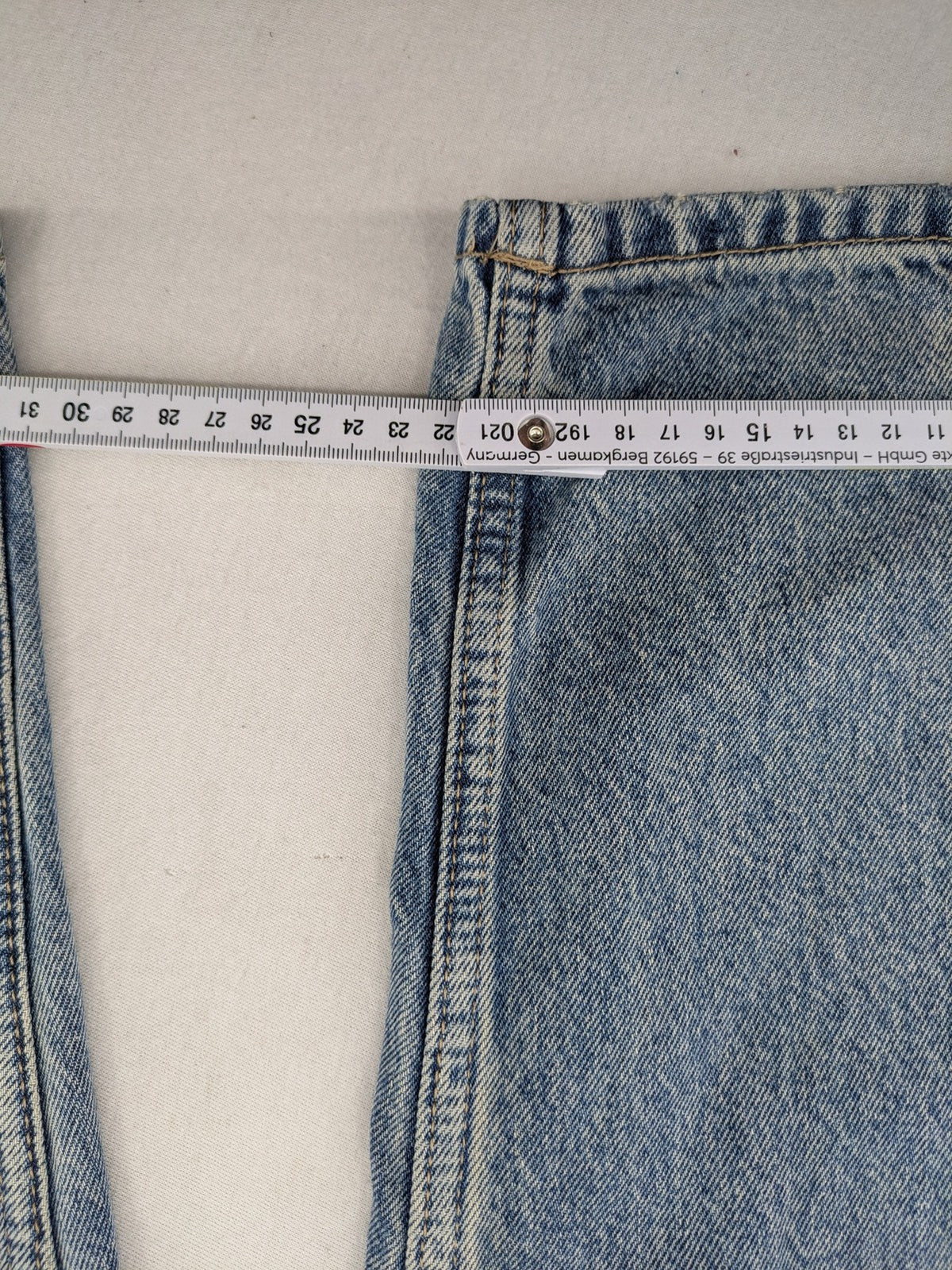 Bershka blue wide leg jeans high waist baggy style with light wash and cotton material.