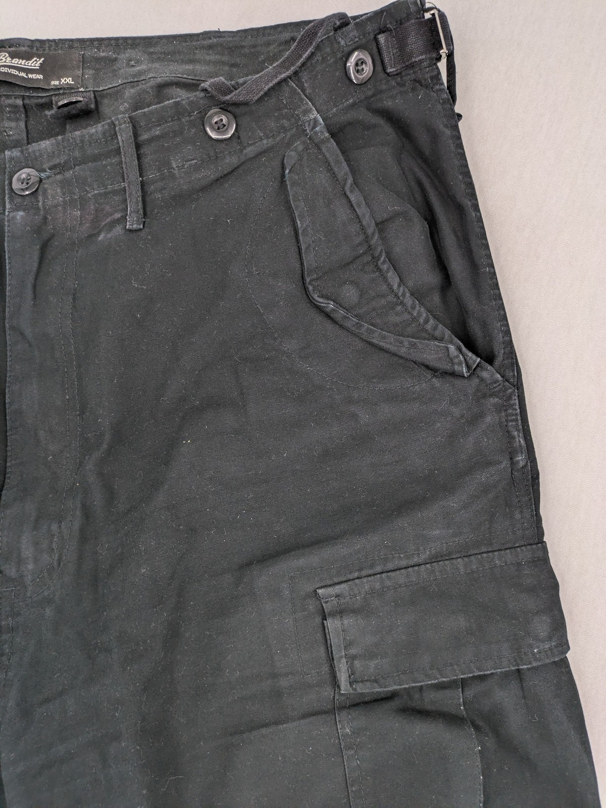 Brandit hunting & tactical pants grey vintage army style with cargo pockets and button fly.