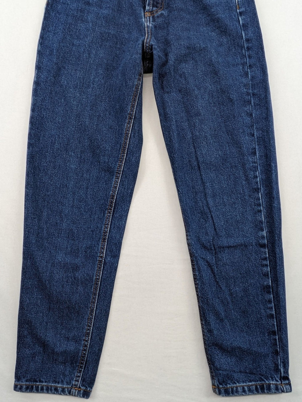 Stradivarius blue mom jeans high waist with button fly and classic denim texture.